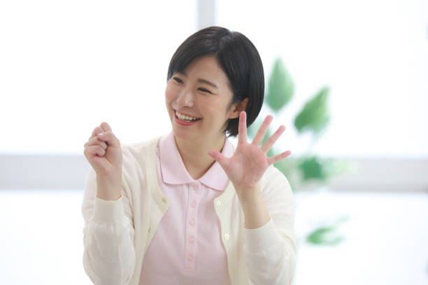istock Image of a caregiver doing fingertip exercises 1320112210