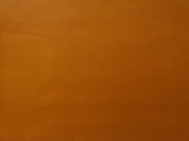 istock Paint​ orange color​ on​ cement​ wall​ finish​ smooth​ polished surface​ texture​ concrete​ material​ for​ background, abstract color, ​floor​ construction​ Architecture, for​ paper​ greeting​ car 1320114319