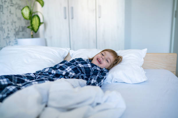 istock Little boy lying in the bed 1320115835