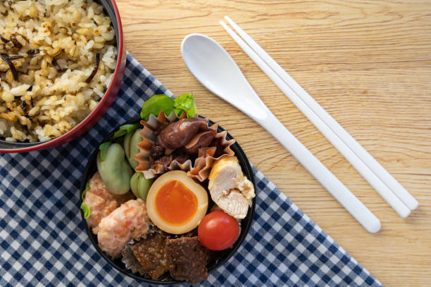 istock Made shrimp mayonnaise lunch box for his wife (round, grain) 1320117253