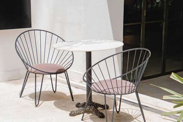 istock Stylish modern chairs and stone table on the spacious terrace 1320118051