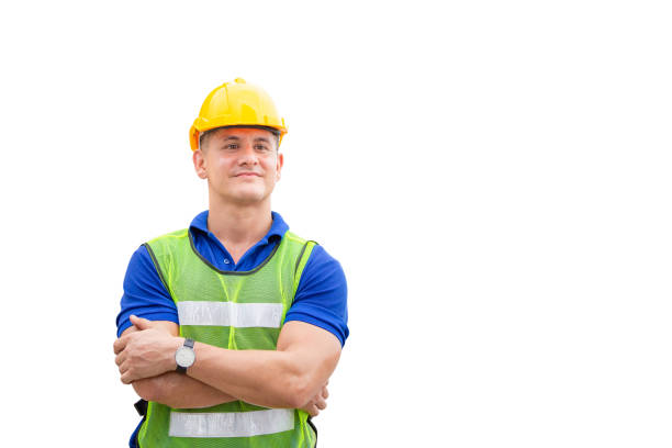istock Cheerful engineer man in hard hat with clipping path with arms crossed on white background 1320118334