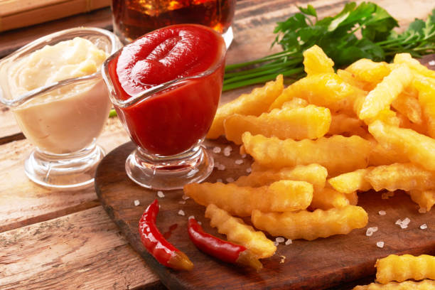 istock french fries on wooden table 1320118944