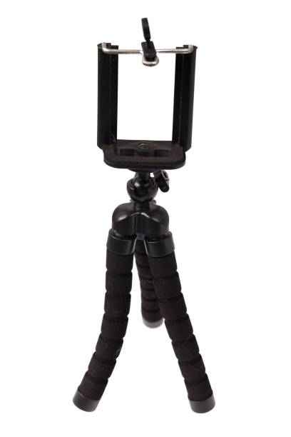 istock Tripod with holder for cellphone, isolated on white background 1320119919