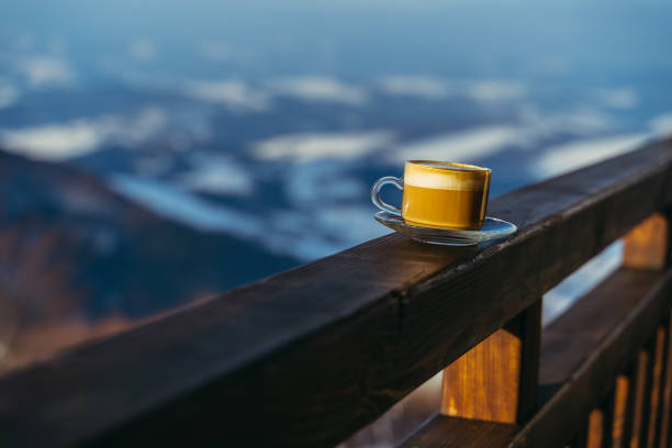 istock Coffee. Cup of coffee with mountain views. 1320121486