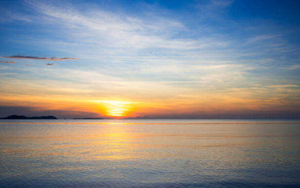 istock Sun and sea sunrise nature background 1320127206