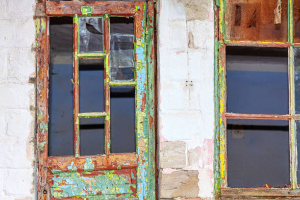 istock Broken wooden door and window 1320129314