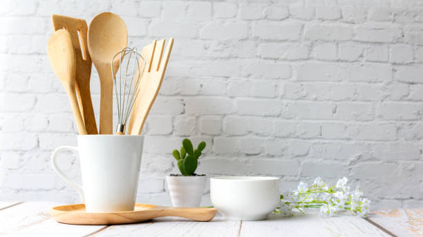 istock Kitchen tools and kitchenware utensil object on kitchen shelf wood white for healthy eat and health care life.  Wall white brick background, copy space for text 1320132052