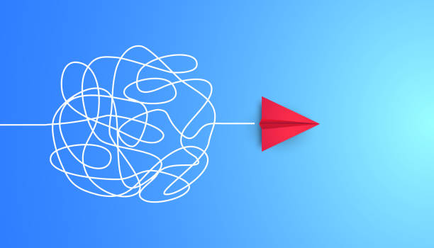 istock Business concept finding a solution or way out of the situation, red paper plane with a confusing path on blue background changes direction, new idea, change, courage, innovation, creative decision. 1320132876