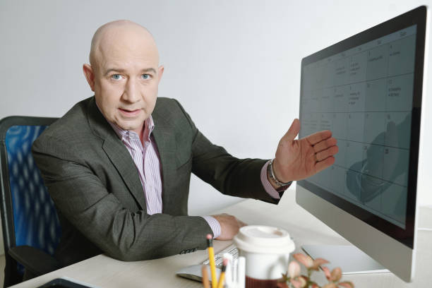 istock Portrait of CEO telling about his timetable 1320135606