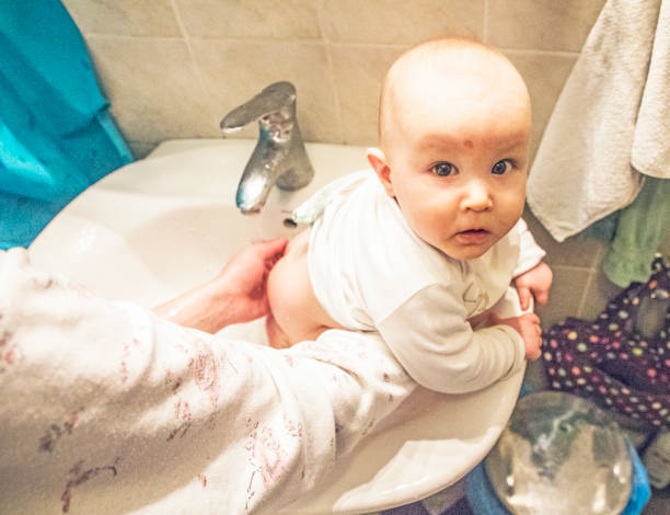 bathing the baby in the sink