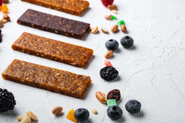 istock Dried fruits bars with copy space, on white background 1320139263