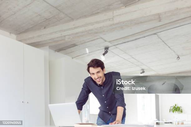 Cheerful Man In The Office Stock Photo - Download Image Now - Men, Standing, Only Men