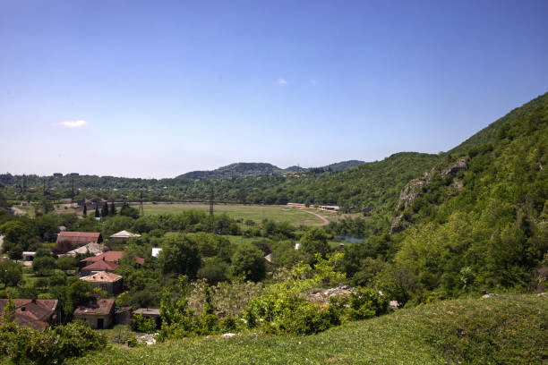 istock panoramic view of the sky, mountains and small town, 1320142862
