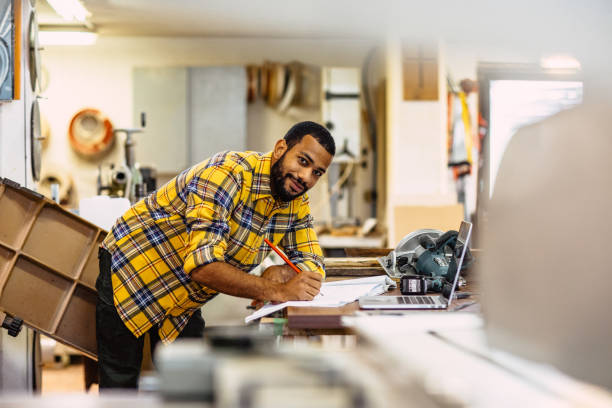 istock Portrait of a carpenter at work 1320143678