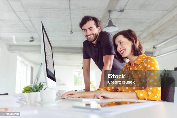 Coworkers In The Office Stock Photo - Download Image Now - 30-39 Years, Adult, Adults Only