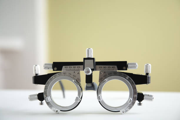 Trial frame on white table. Ophthalmologist tool Trial frame on white table. Ophthalmologist tool lens optical instrument stock pictures, royalty-free photos & images