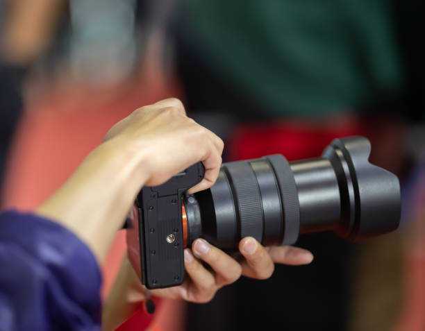 istock Photographer taking pictures 1320149747