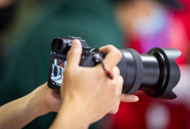 istock Photographer taking pictures 1320149828