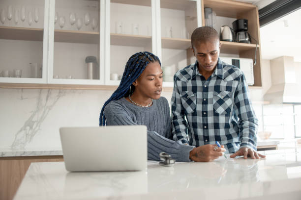 istock Couple organizing their finances. 1320152783