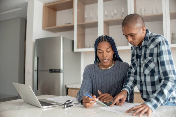 istock Couple organizing their finances. 1320152786