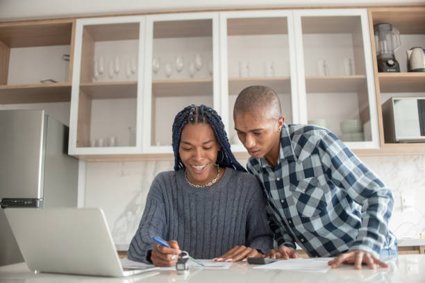 istock Couple organizing their finances. 1320152813