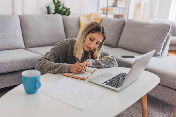 istock Woman studying oat home 1320155233