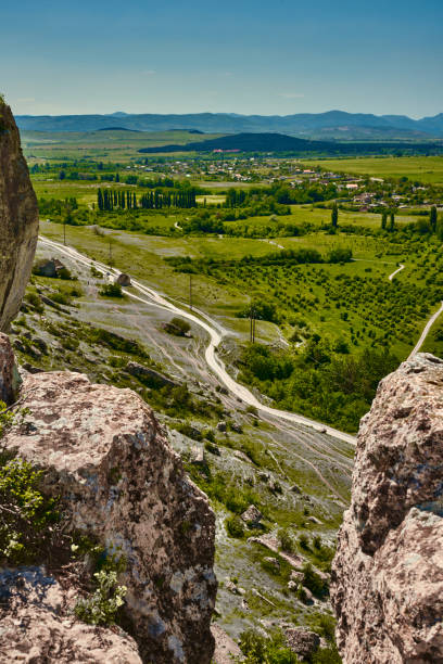 istock Landscape green fields and view from the mountain 1320155342
