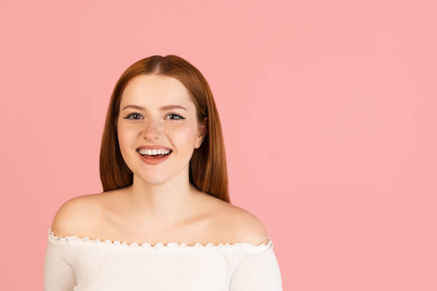 istock Caucasian woman's portrait isolated over pink studio background with copyspace for ad. Concept of beauty, health. 1320156572
