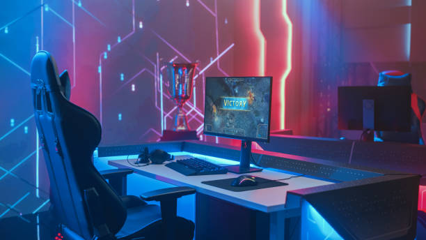istock On Cyber Gaming Championship: Empty Gaming Station with Player's Computer Screen Showing Video Game Victory. Online Cyber Gaming Tournament Live Streaming Event 1320158062