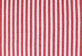 istock Red and white striped beach towel 1320158343