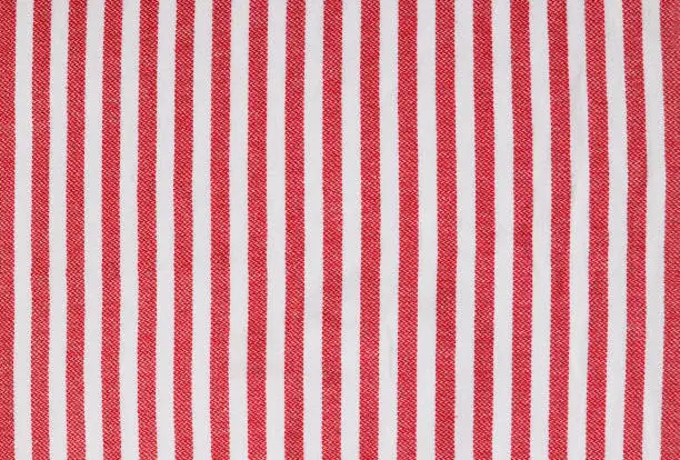 Photo of Red and white striped beach towel