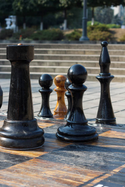 istock Chess competition in the open air, with great chess in human growth 1320159224
