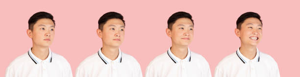 istock Asian man's portrait isolated over pink studio background with copyspace. Evolution of emotions. 1320159342