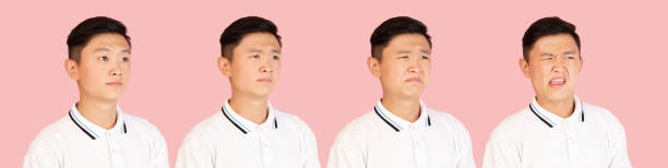 istock Asian man's portrait isolated over pink studio background with copyspace. Evolution of emotions. 1320159351