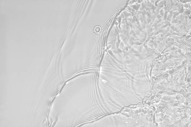 istock desaturated transparent clear calm water surface texture 1320159360