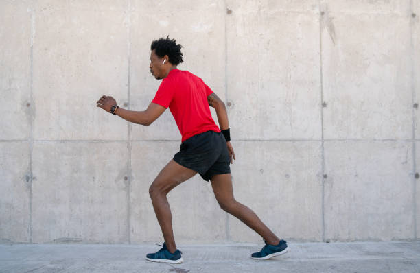 istock Athletic man running and doing exercise outdoors. 1320162353