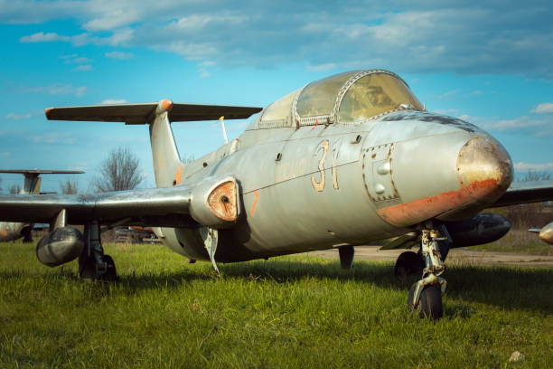 istock Old Soviet military aircraft standing at the airfield. Rusty used technique 1320162582