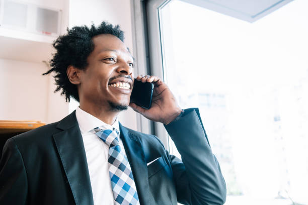 istock Businessman talking on phone at office. 1320162698