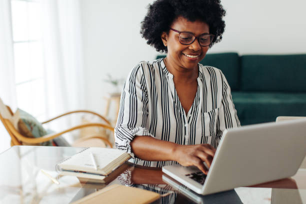 istock Woman working on laptop at home 1320165432