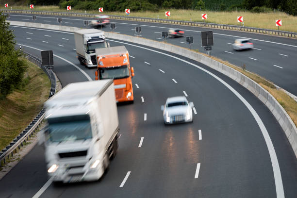 istock Heavy Goods Transportation in Germany, Trucks Speeding, Aerial View 1320168144