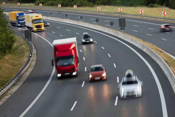istock Heavy Goods Transportation in Germany, Trucks Speeding, Aerial View 1320168330