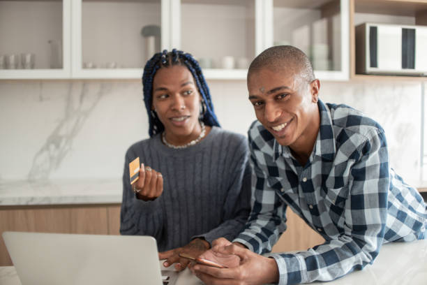 istock Couple buying online. 1320169260