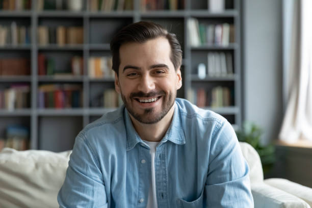 istock Happy young 30s handsome caucasian man holding video call. 1320169761