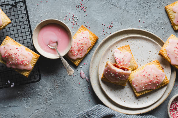 istock Toaster pastry with icing cream and sugar sprinkles 1320170733