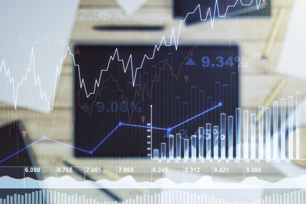 istock Double exposure of abstract creative financial diagram and modern digital tablet on background, banking and accounting concept 1320171608