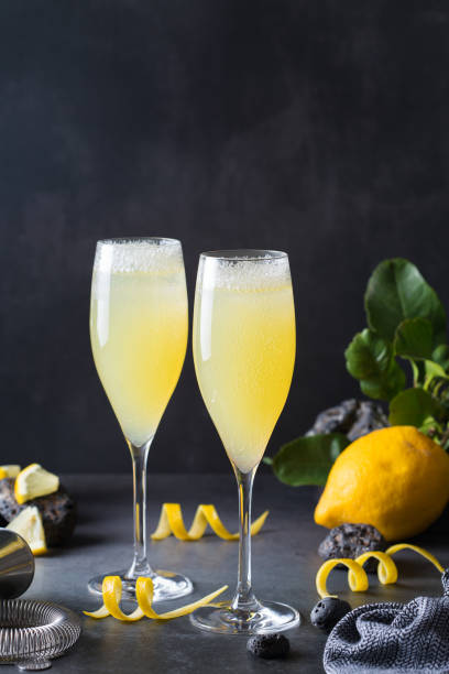 French 75 cocktail with lemon hard seltzer instead of champagne stock photo