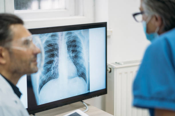istock Discussing about patient's lungs during COVID-19 pandemic 1320173470