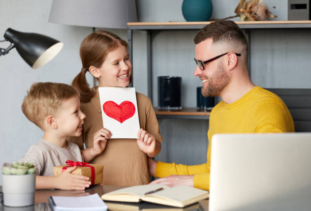 istock Little kids son and daughter making surprise for dad on Father's 1320176056