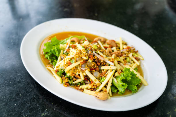 Thai spicy three eggs salad, popular thai seafood dish